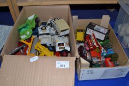 Two boxes of assorted toy cars, trucks and other models