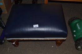 Navy blue faux leather upholstered footstool