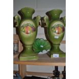 Pair of green glazed and fruit decorated vases and a glass dish