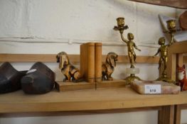 Mixed Lot: Wooden book ends, onyx mounted brass cherub candlesticks and others