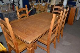 Pine dining table and five matching chairs