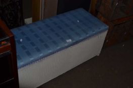 White painted blanket box with upholstered top