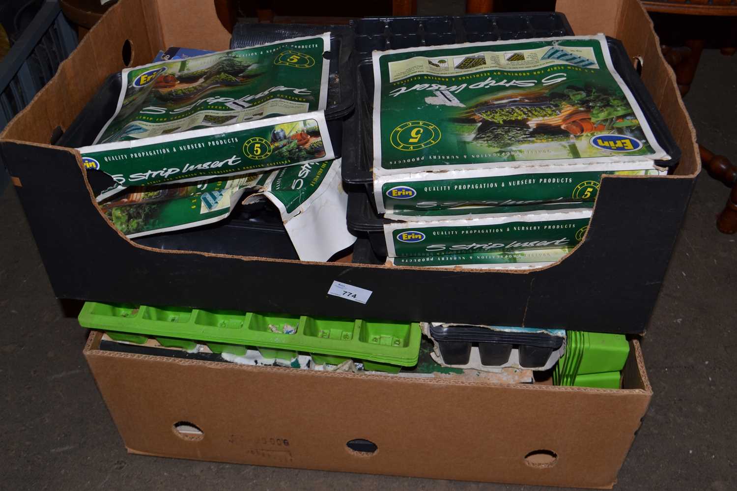 Two boxes of assorted seed trays
