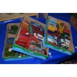 Three boxes of assorted toy cars, play worn