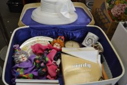 Mixed Lot: White suitcase together with a lady's dress hat, two clown wall clocks and other items