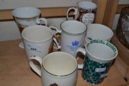 Quantity of commemorative mugs