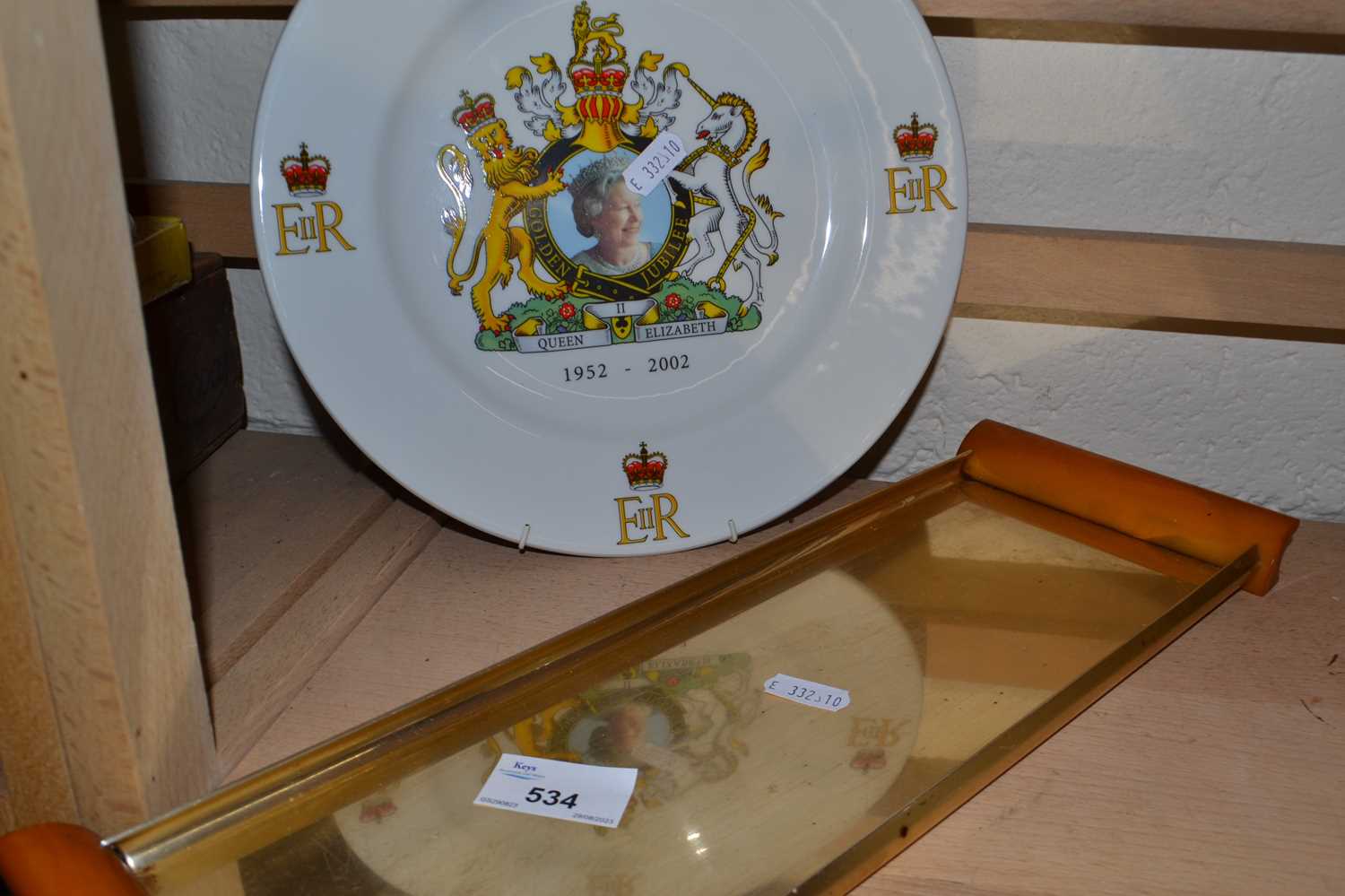 A QEII Golden Jubilee collectors plate and metal tray