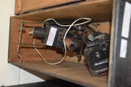 Two vintage film projectors comprising the Pathiscope Kid and one other plus further accessories