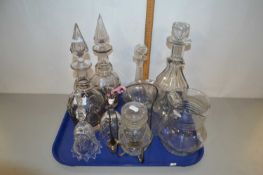 A tray of various decanters and other glass wares