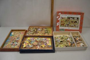 A box of vintage jigsaw puzzles