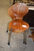 Set of four teak dining chairs by Phoenix, set on chrome legs
