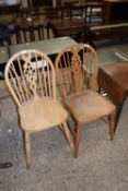 Two wheel back kitchen chairs