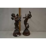 A pair of bronzed finish Spelter models of cherubs