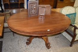 Victorian oval topped mahogany veneered tilt top table raised on a tripod base