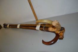 Mixed Lot: Four assorted walking sticks