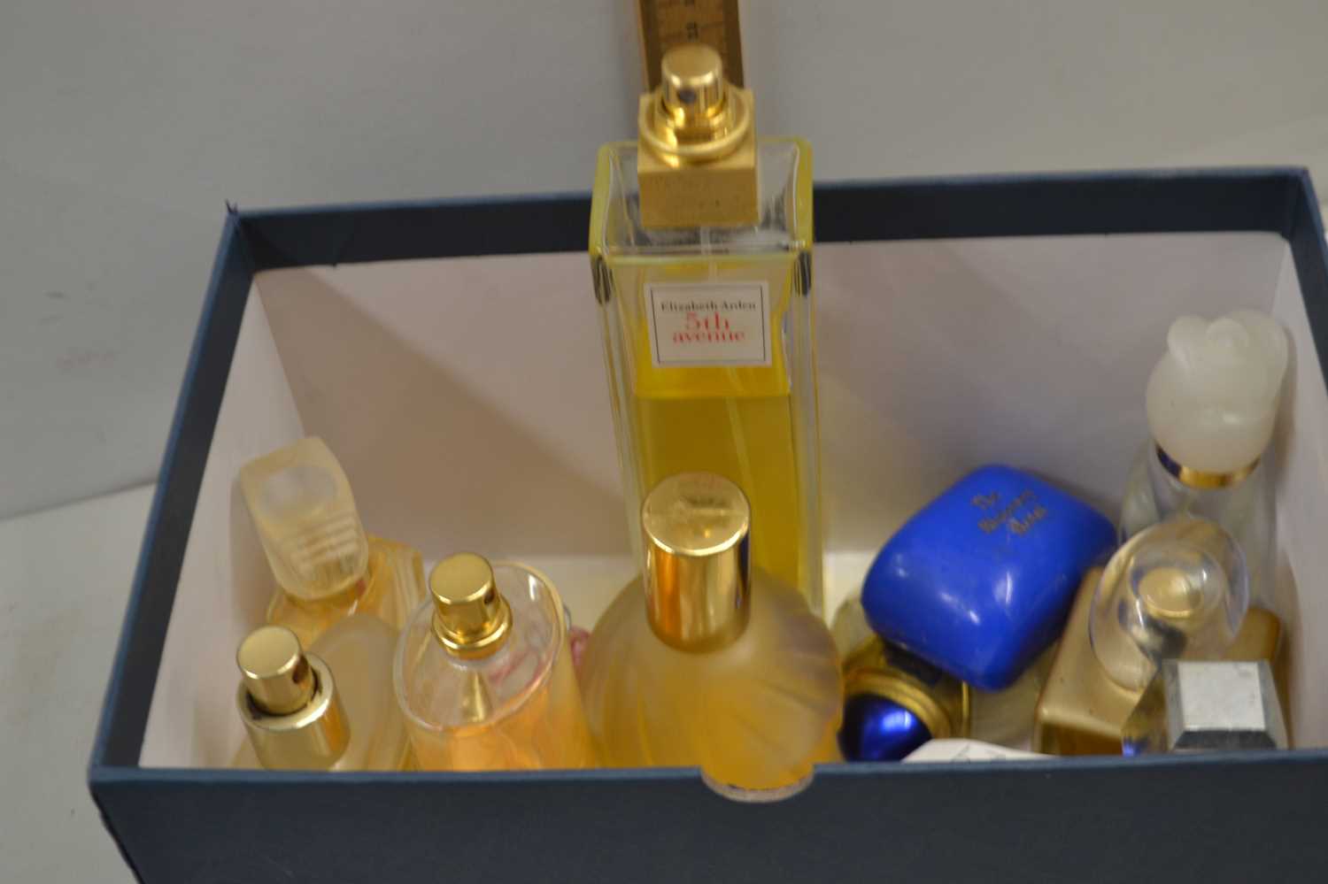 Box of various vintage perfume bottles