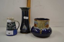 Mixed Lot: Three various small Doulton vases