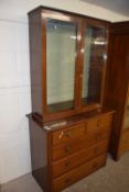 Late Victorian American walnut chest of five drawers together with a related glazed top section,