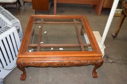 Square glass top coffee table