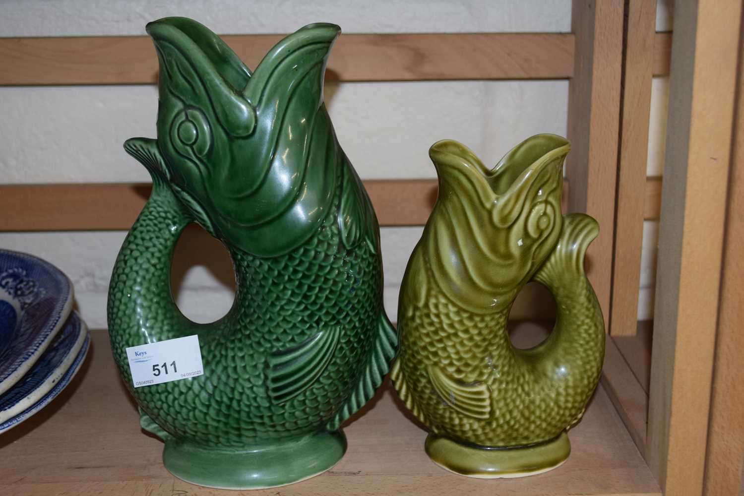 Two Dartmouth fish vases