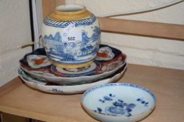 A pair of Imari palate plates together with a ginger jar (no lid) and a blue and white saucer