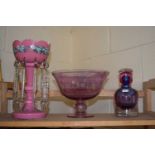 Pink glass bowl and stand together with a pink glass lustre and a pink and purple glass decanter