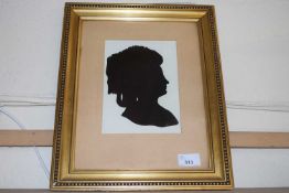 A silhouette of a lady, framed