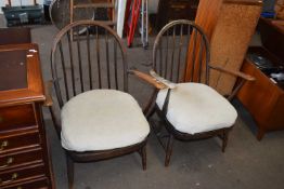 Pair of stick back armchairs with sprung and cushioned seats