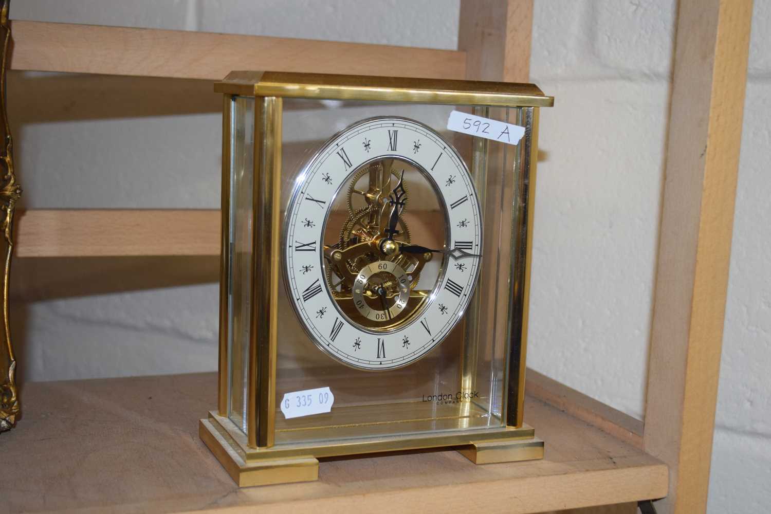 The London Clock Company brass and glass case mantel clock