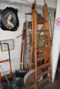 Two folding step ladders and a large quantity of assorted gardening tools