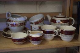 A quantity of red and gilt decorated tea wares