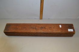A vintage wooden cigar press marked to the front Hier Offene W & W 17644 BK 16B