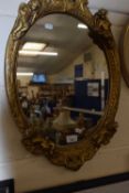 Over wall mirror in plaster work frame