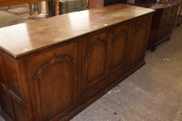 Good quality oak combination sideboard and television cabinet with arched doors, 200cm wide