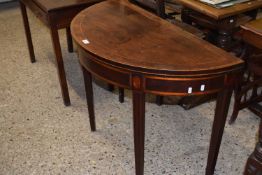 A Georgian mahogany and cross banded half moon tea table, 99cm wide