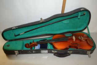 Cased violin