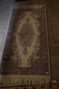 Small modern floral rug, 140cm long
