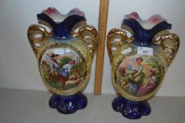 Pair of gilt decorated double handled vases