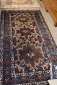 20th Century Middle Eastern wool floor rug decorated with geometric design in a blue background,
