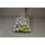 Bag of assorted golf balls
