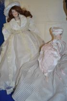 Two contemporary porcelain headed dolls