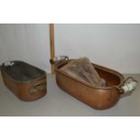 Two oval copper planters and further wall bracket