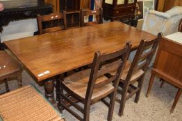 20th Century oak refectory dining table and four rush seated chairs, table 153cm long