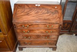 George III mahogany bureau with full front opening to a fitted interior over a four drawer base with