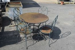 Circular iron garden table and four chairs
