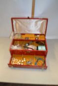 Cantilever jewellery box containing various assorted costume jewellery, wristwatches etc