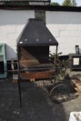 Cast iron barbecue trolley with hood