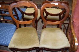 Set of four Victorian mahogany balloon back dining chairs