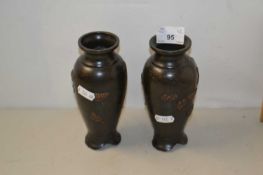 Pair of small Japanese bronze vases decorated with birds and flowers, 16cm high