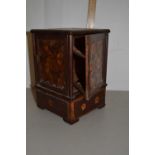 An inlaid smokers cabinet